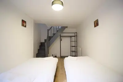 Un ou plusieurs lits dans un hébergement de l'établissement Triplex Lumineux à Cherbourg, hyper centre, 2 pas du Port & Vie Nocturne, Intendance Luxury Host