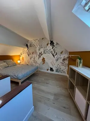 Un ou plusieurs lits dans un hébergement de l'établissement Le Terracotta - joli duplex centre ville