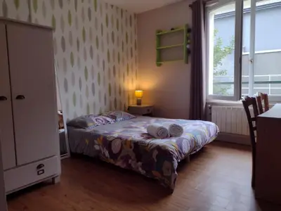 Un ou plusieurs lits dans un hébergement de l'établissement Petit appartement - Quartier Vaugueux Château