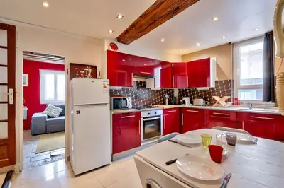 Cuisine ou kitchenette dans l'établissement Appartement quartier Vaugueux