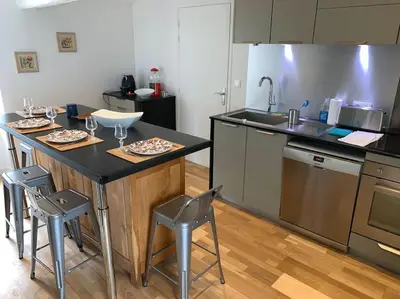 Cuisine ou kitchenette dans l'établissement Petite Villa de impasse du Prieure