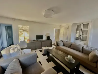 Coin salon dans l'établissement La Pommeraie, maison avec très grand jardin
