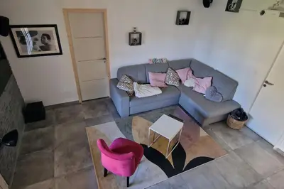 Coin salon dans l'établissement Maison 6 chambres avec piscine proche Cabourg