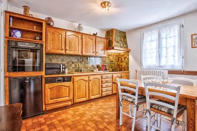 Cuisine ou kitchenette dans l'établissement La Maison Fabane - Hypercentre de Carentan