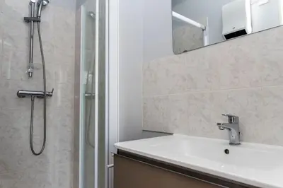 Salle de bains dans l'établissement Beau duplex, proche zénith et palais des sports