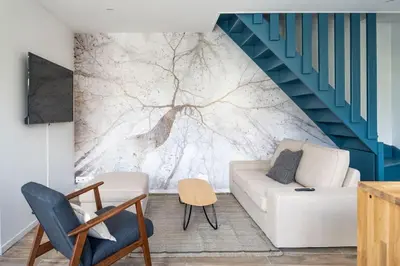 Coin salon dans l'établissement Triplex de qualité, quartier calme