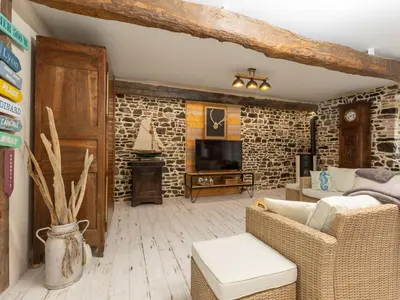 Télévision ou salle de divertissement dans l'établissement Holiday Home Tiegezh by Interhome