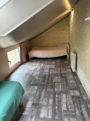 Un ou plusieurs lits dans un hébergement de l'établissement Maison de campagne 6 personnes