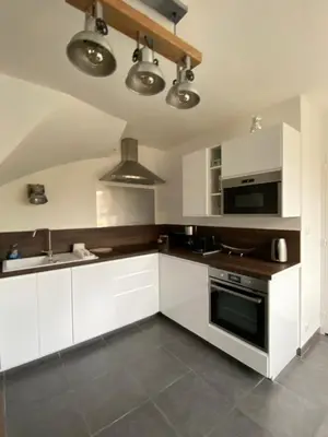 Cuisine ou kitchenette dans l'établissement La Maison du Lavoir