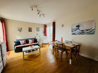 Coin salon dans l'établissement Appartement résidence calme proche centre-ville