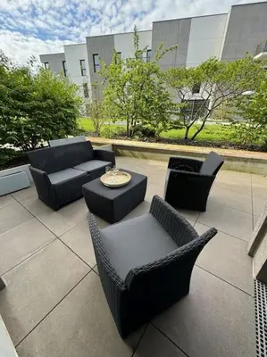 Coin salon dans l'établissement Appartement spacieux avec terrasse
