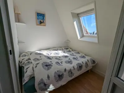 Un ou plusieurs lits dans un hébergement de l'établissement Appartement vue sur mer et accès direct à la plage