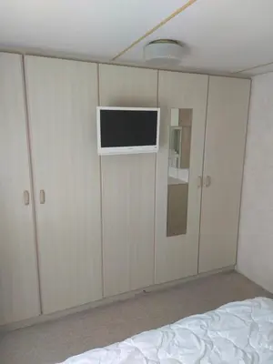 Télévision ou salle de divertissement dans l'établissement Mobilhome à cancale