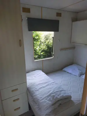 Un ou plusieurs lits dans un hébergement de l'établissement Mobilhome à cancale