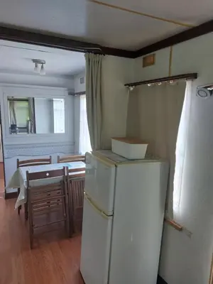 Cuisine ou kitchenette dans l'établissement Mobilhome à cancale