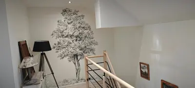 Télévision ou salle de divertissement dans l'établissement Le Jardin des 2 Cèdres