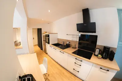 Cuisine ou kitchenette dans l'établissement Les Mouettes - Centre Ville - à 500m du Port