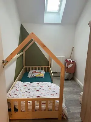 Un ou plusieurs lits dans un hébergement de l'établissement Maison à Luc sur Mer