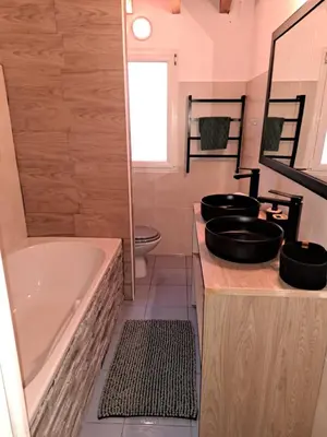 Cuisine ou kitchenette dans l'établissement Cottage La Chaumière