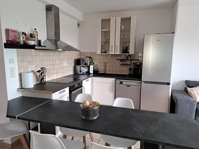 Cuisine ou kitchenette dans l'établissement Cottage La Chaumière