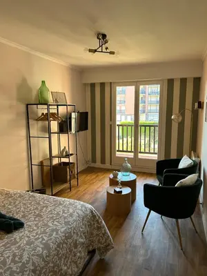 Un ou plusieurs lits dans un hébergement de l'établissement La Suite Émeraude - Cosy, chic et bord de mer