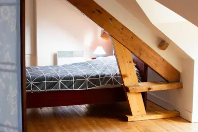 Un ou plusieurs lits dans un hébergement de l'établissement Gîte 