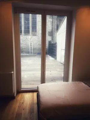 Un ou plusieurs lits dans un hébergement de l'établissement Grande maison moderne 5 chambres