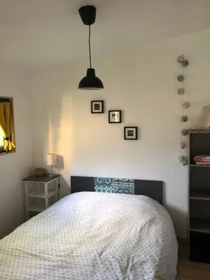 Un ou plusieurs lits dans un hébergement de l'établissement Le Petit Chalet de la Plage - Terrasse & Jardinet
