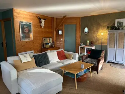 Coin salon dans l'établissement La Maison Mimosa - Espace, Confort et Proche Plage