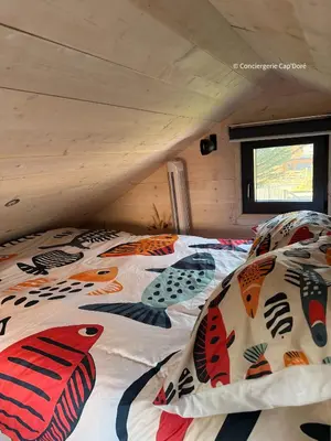 Un ou plusieurs lits dans un hébergement de l'établissement Le Cabanon - Tiny House 150m de la Plage