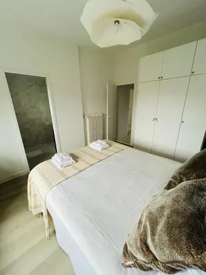 Un ou plusieurs lits dans un hébergement de l'établissement La Maison du Nice Caennais