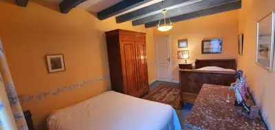 Un ou plusieurs lits dans un hébergement de l'établissement Maison typique Normande Mont St Michel