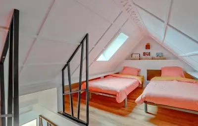 Un ou plusieurs lits dans un hébergement de l'établissement 1 Bedroom Cozy Apartment In Carolles