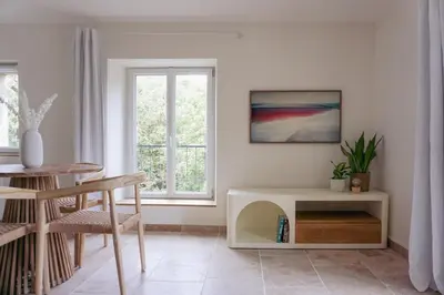 Coin salon dans l'établissement Les Voiles Blanches - Appartement dans un château