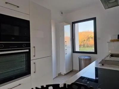 Cuisine ou kitchenette dans l'établissement Côté DUNES