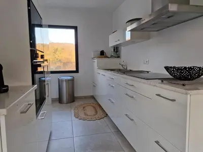Cuisine ou kitchenette dans l'établissement Côté DUNES