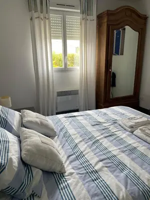 Un ou plusieurs lits dans un hébergement de l'établissement Gite du Corps de Garde - Bord de Mer Normandie