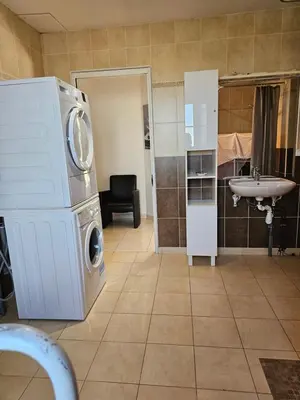 Cuisine ou kitchenette dans l'établissement gite de villée