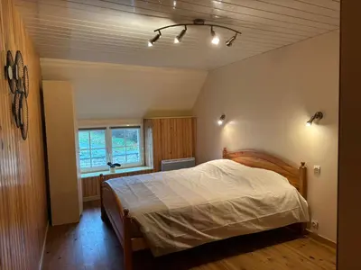 Un ou plusieurs lits dans un hébergement de l'établissement Maison à Boutteville - Proche Ste Mère Eglise