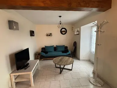 Télévision ou salle de divertissement dans l'établissement Maison à Boutteville - Proche Ste Mère Eglise