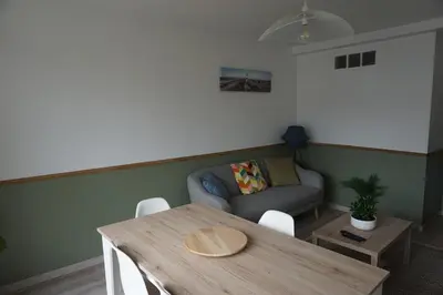 Coin salon dans l'établissement Appartement confortable