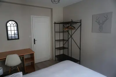 Un ou plusieurs lits dans un hébergement de l'établissement Appartement confortable