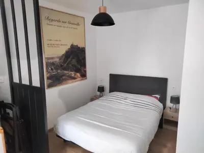 Un ou plusieurs lits dans un hébergement de l'établissement Superbe appartement