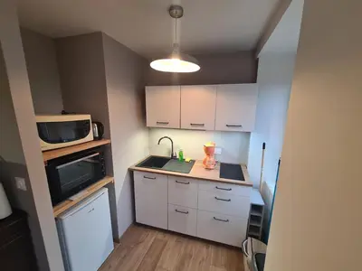 Cuisine ou kitchenette dans l'établissement Superbe appartement