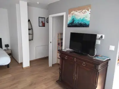 Télévision ou salle de divertissement dans l'établissement Superbe appartement