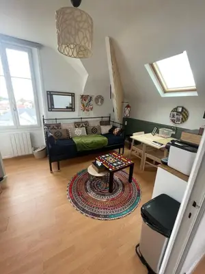 Coin salon dans l'établissement Un cocon au Presbytère avec place de parking voiture gratuite