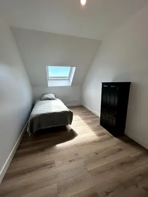Un ou plusieurs lits dans un hébergement de l'établissement Modern renovated apartment #8 with 7pers mezzanine
