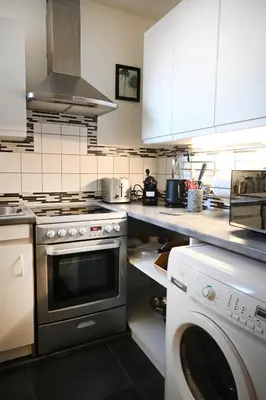 Cuisine ou kitchenette dans l'établissement LE COSY 73 - Proche plage et port de Granville