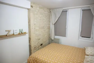 Un ou plusieurs lits dans un hébergement de l'établissement Plein cœur Historique de Caen - Quartier animé - au pied des boutiques, bars et restaurants