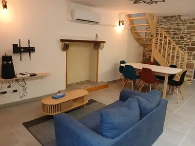 Coin salon dans l'établissement Montgenêts